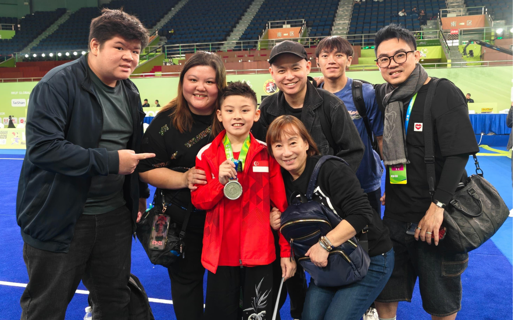 Randall Lim with his family and coaches at the 10th World Junior Wushu Championships 2026