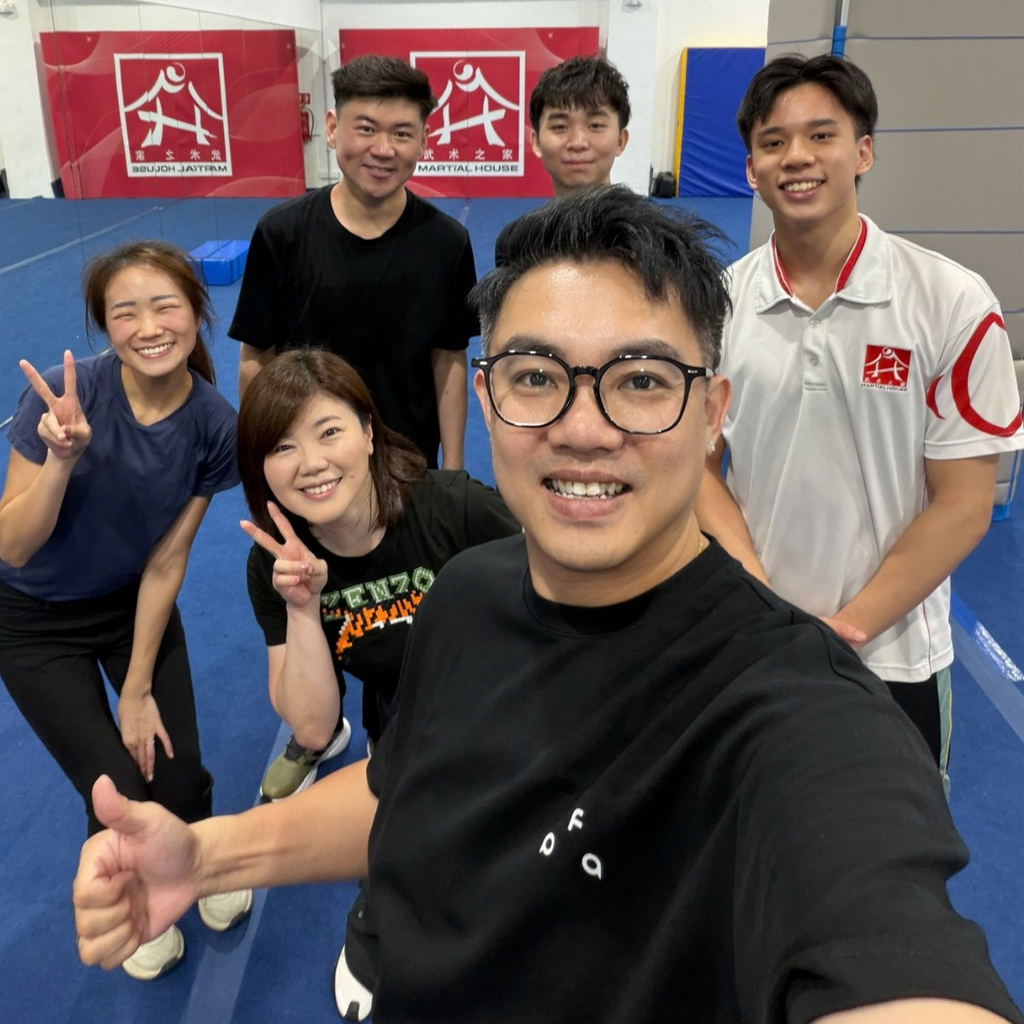 Koh Le Bon and Carlos Tan guiding the DJs from Capital 95.8FM through the fundamentals of Wushu and Taiji on Facebook "live"
