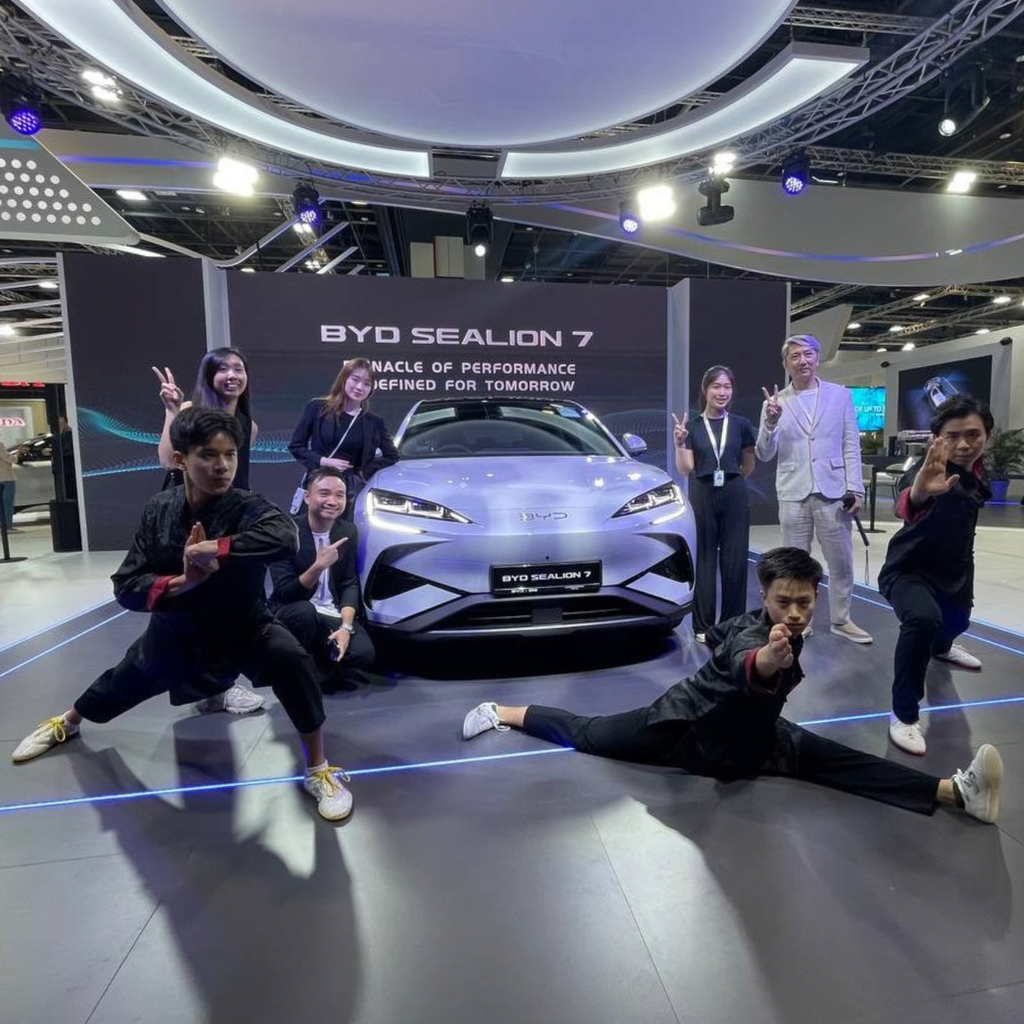 Chia Kai Ming, Koh Le Bon and Carlos Tan performing at Singapore Motor Show 2025 to launch the BYD Sealion 7
